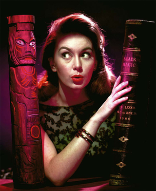Illustration for article titled The Spine-Tingling Glamour of Hammer Pinup Girls